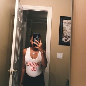 bodysuit (one in yellow the other in white)